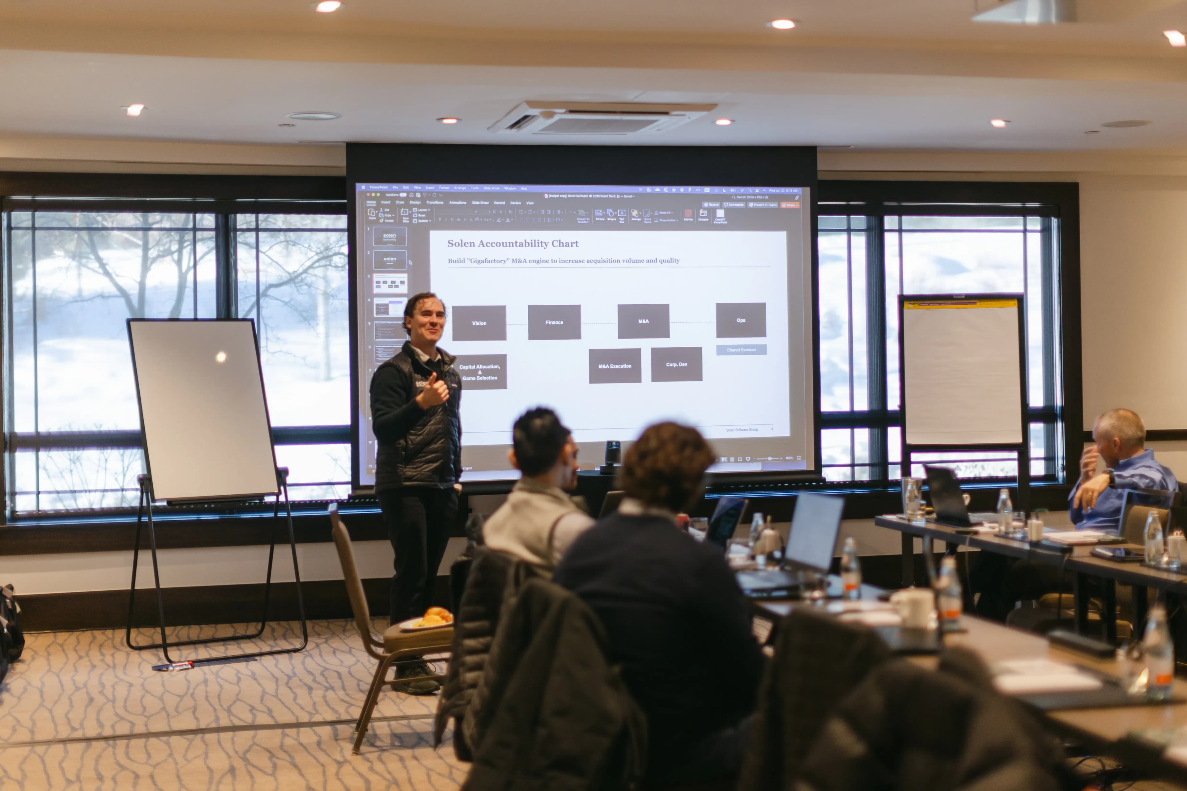 Professional business meeting showcasing permanent capital partnership